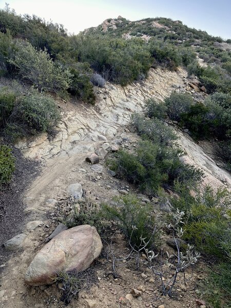 The first big rock climb section on the way up Chumash Trail. (There's a few short rubble piles before this, but this is where the real fun of this trail begins). This section is rough and off-camber, but the rock is grippy and solid, so it's rideable : )