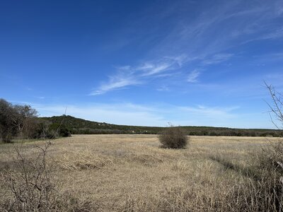 Looking from the valley floor up to the hilltop.