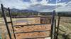 Gate at N. end of Catalina state park.  2.7 miles from equestrian parking. Turn right after gate for singletrack or straight for doubletrack shortcut.