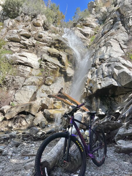 The approximately 50 foot seasonal waterfall located at about the halfway point.