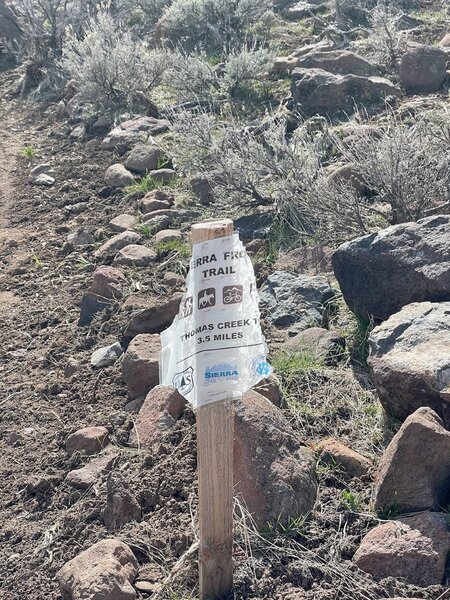 Trail sign at the point it meets the Ballardini Ranch Trail on a jeep track.