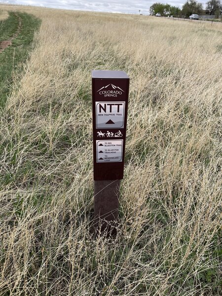 Trailhead sign at Fontain Blvd & Goldfield Dr (facing east)