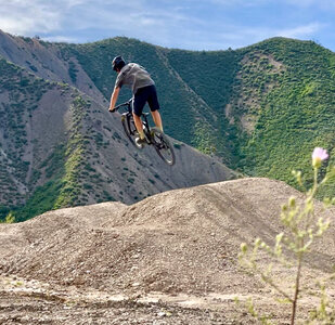 Alpine Slide Trail - flying over a big double jump: photo credit: Brian Buell!