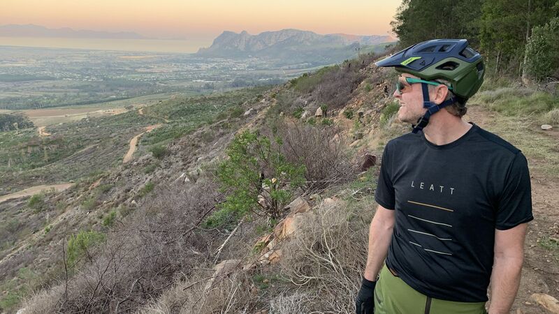 Rider gazing out across the Cape landscape, looking forward to an exhilarating and fun filled descent.