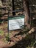 Entrance sign a George Mitchell Preserve at Eastern terminus of trail.