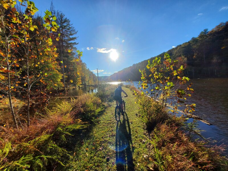 Riding along the lake on Fisherman's Trail at the golden hour!