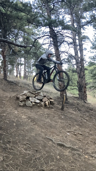 Bill Powell launching off one of the many purpose built trail features!