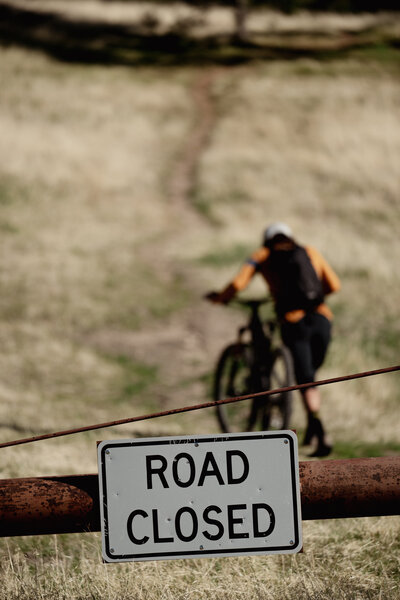 Old road is closed to vehicles, but bike gate is open - this is where you enter.