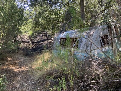 Old trailers trailside from workers at the mine.