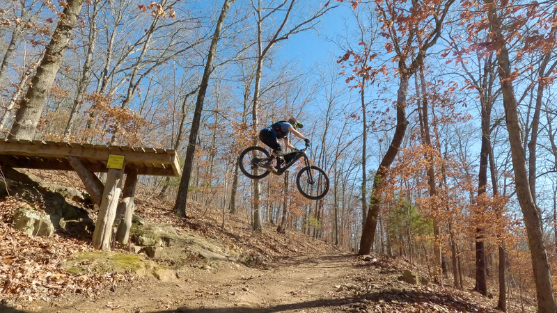 This fairly high speed drop.  I like to start up high, give it 2-3 pedal strokes, then coast brakeless through all the rocky bits and then send it.   The landing is smooth.  I've sent this 20 times and never bottomed out.