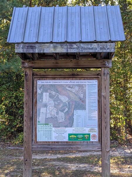 Trail map at kiosk at Trail Hub.  Trails have distance markers with a QR code to bring up the system map and the users location.