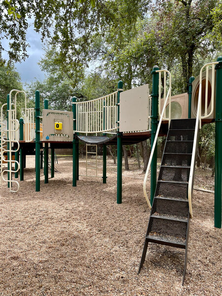 This photo shows the playground (Majestic Oaks Park) that the Coralberry Trail passes through.