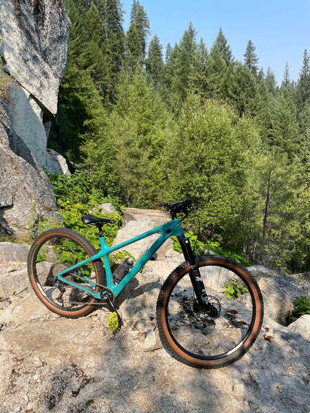 Boulder/rock formation that one must climb. Not hard. Annoying for some.