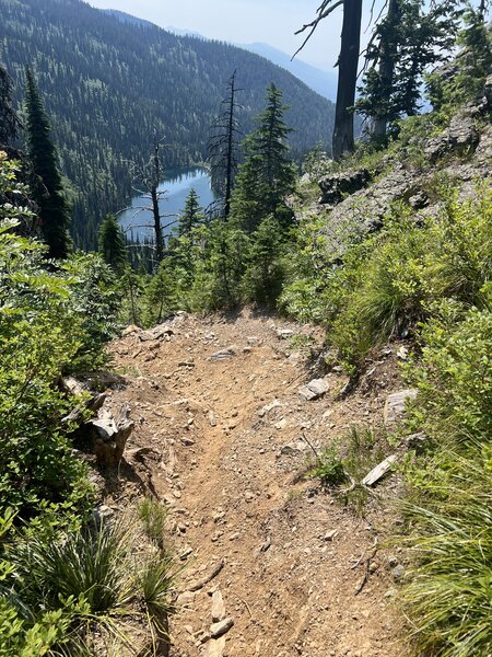 When you bomb onto this switchback, it always looks like you might going flying right off the cliff into Hall Lake.