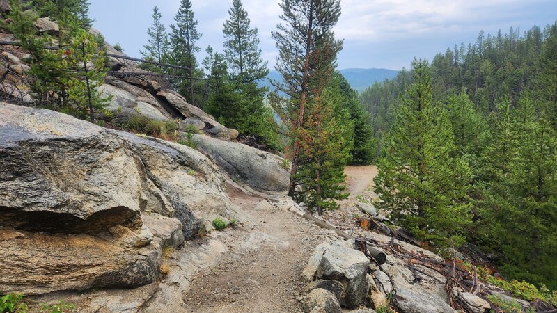 The bottom of the chimney trail, where they blasted the rocks in 2024.