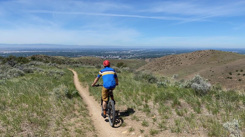 Descending 3 Bears Trail overlooking the city of Boise.