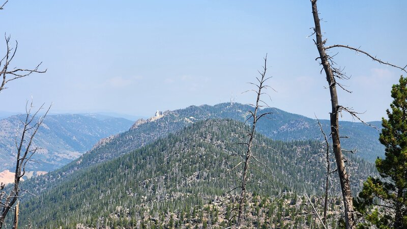 The view looking across the Butte East Ridge of the Continental Divide towards the iconic stature of Our Lady.