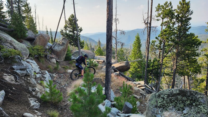 A mountain bike rider negotiates one of the many switchbacks of the Fairy Trail.