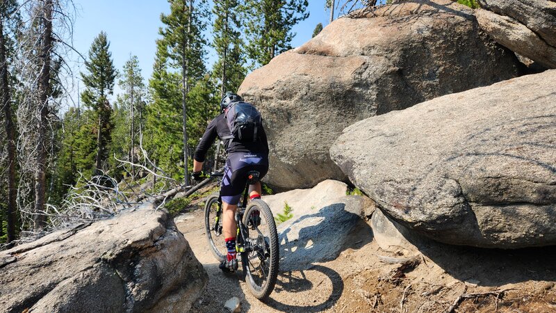 Riding between granite boulders on the Our Lady Trail.