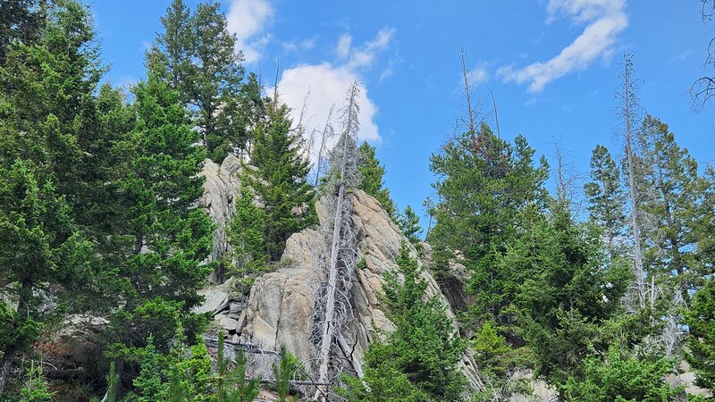 The lower section of the Toll Canyon Trail has many impressive granite rock formations on either side of the gully.