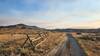 BLM #3 Trail beside a small section of wooden fence with Dry Mountain in the background.