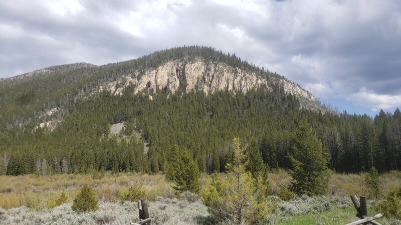 A mountain with impressive cliffs viewed from the Foster Creek Rd.