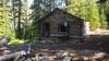 A old cabin on the side of Pozega Lake.