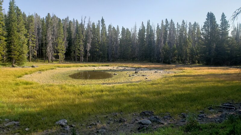 A small lake on the side of the CDT trail.