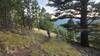 A mountain bike rider on the CDT trail above the Lowlands area.