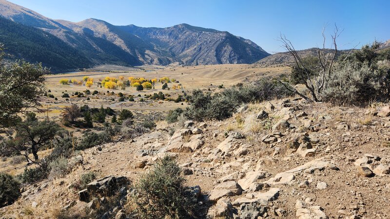 One of the more technical and rocky sections of Eastside Trail, with the Park Campground and the Jefferson River in the Background.