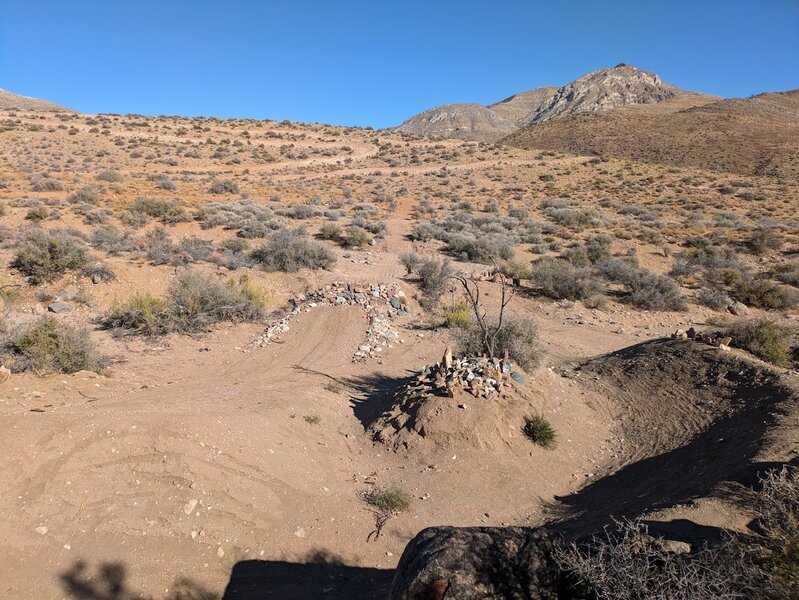 Last gap jumps and optional "easy-out" alternate berm and final turn.