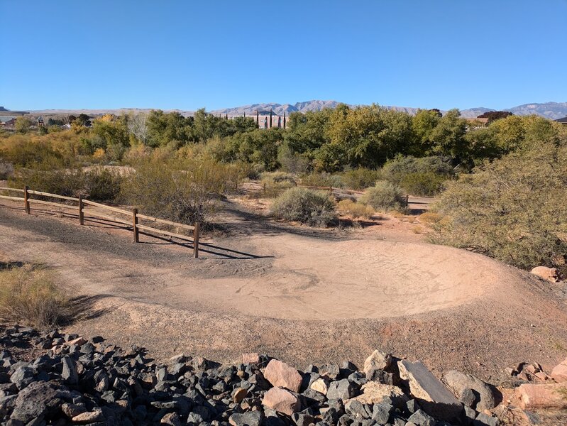 Venom skills park berms near the Snake Hollow Access road and the NICA XC intersection.