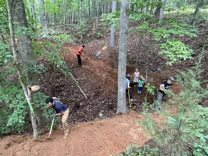 Volunteers building Bottleneck Trail in May 2024.