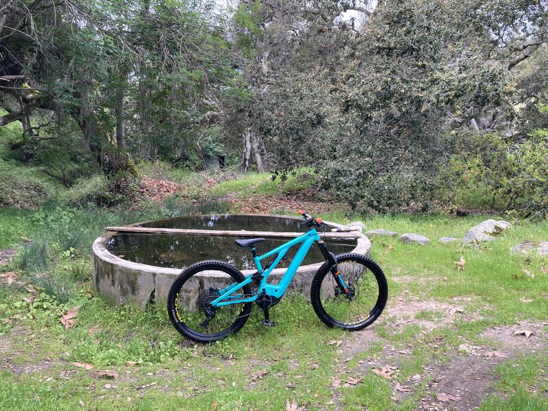The water trough marks the end of the narrow challenging portion, the remainder is much wider and more mellow, and eventually joins Harper Canyon Rd.