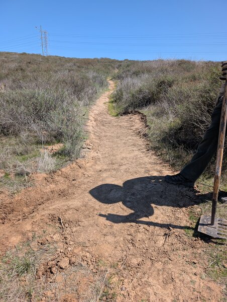 Adding drains on Rim Connector trail.