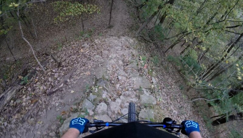 Down the rocky slope.