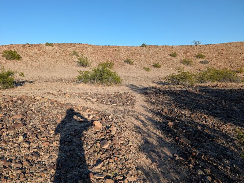 Intersection after last wash go left.