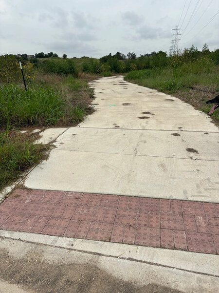 Paved path entry from Kemba Ln.