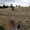 The piles of rocks on the edges of the trail are a sign to tell you to turn right here.