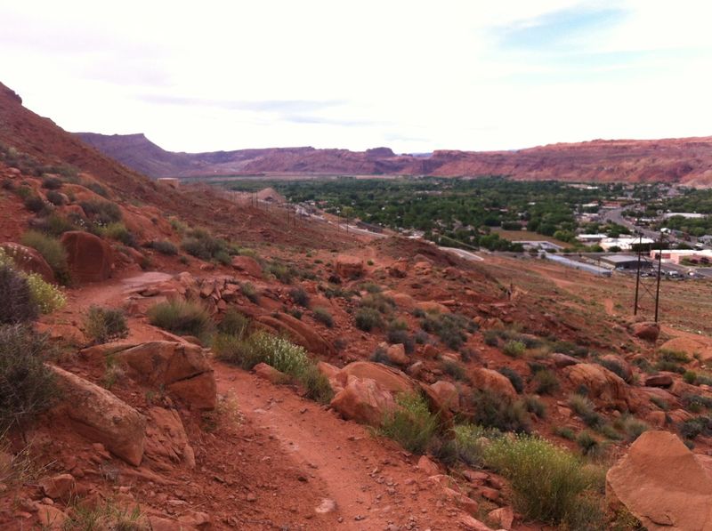 The is bordered by private property, mostly commercial buildings along the 191.