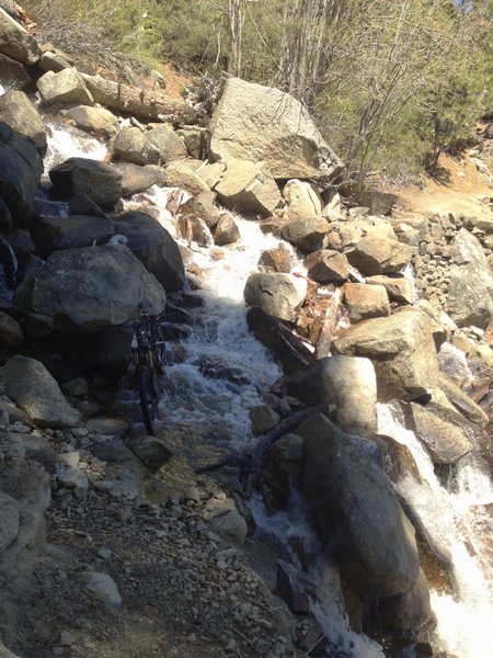 Spring riding in South Lake Tahoe.. the snow melt overflowing the trail!